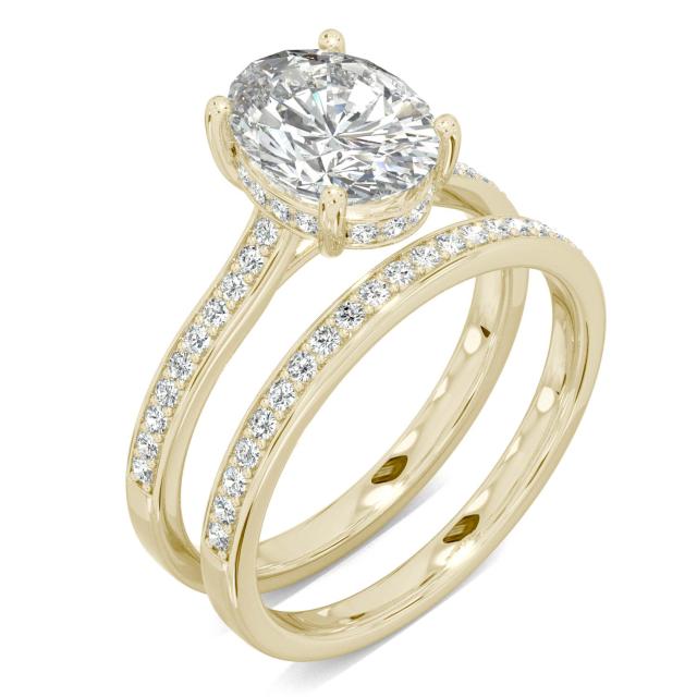 2.55 CTW DEW Oval Forever One Moissanite Hidden Halo with Side Accents Bridal Set Ring in 14K Yellow Gold