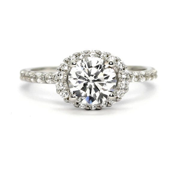 Floating Oval Halo With 1 Carat Forever Brilliant Moissanite, @MondiNYC on Etsy, $1,400