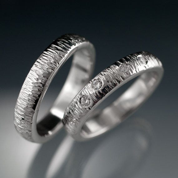 These bands by the talented Konstanze of Nodeform feature textured metal AND the sparkle of moissanite 