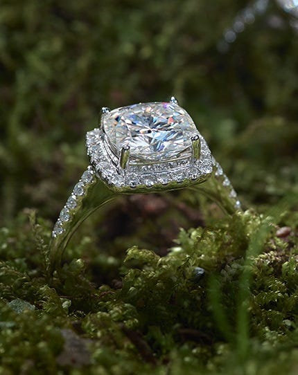 The Anahi ring, available on Moissanite.com, has both a moissanite center stone AND a moissanite halo