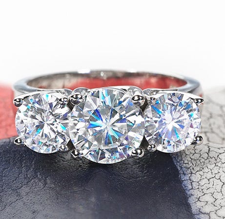 The Margie ring, available on Moissanite.com, features three round brilliant cut moissanite stones